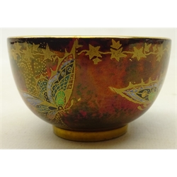  Fieldings Devon Sylvan Lustrine bowl in the form of a tea bowl painted and gilded with butterflies on a rouge royale ground, D8cm  