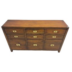 Cherrywood military style sideboard chest, fitted with nine drawers with recessed brass handles