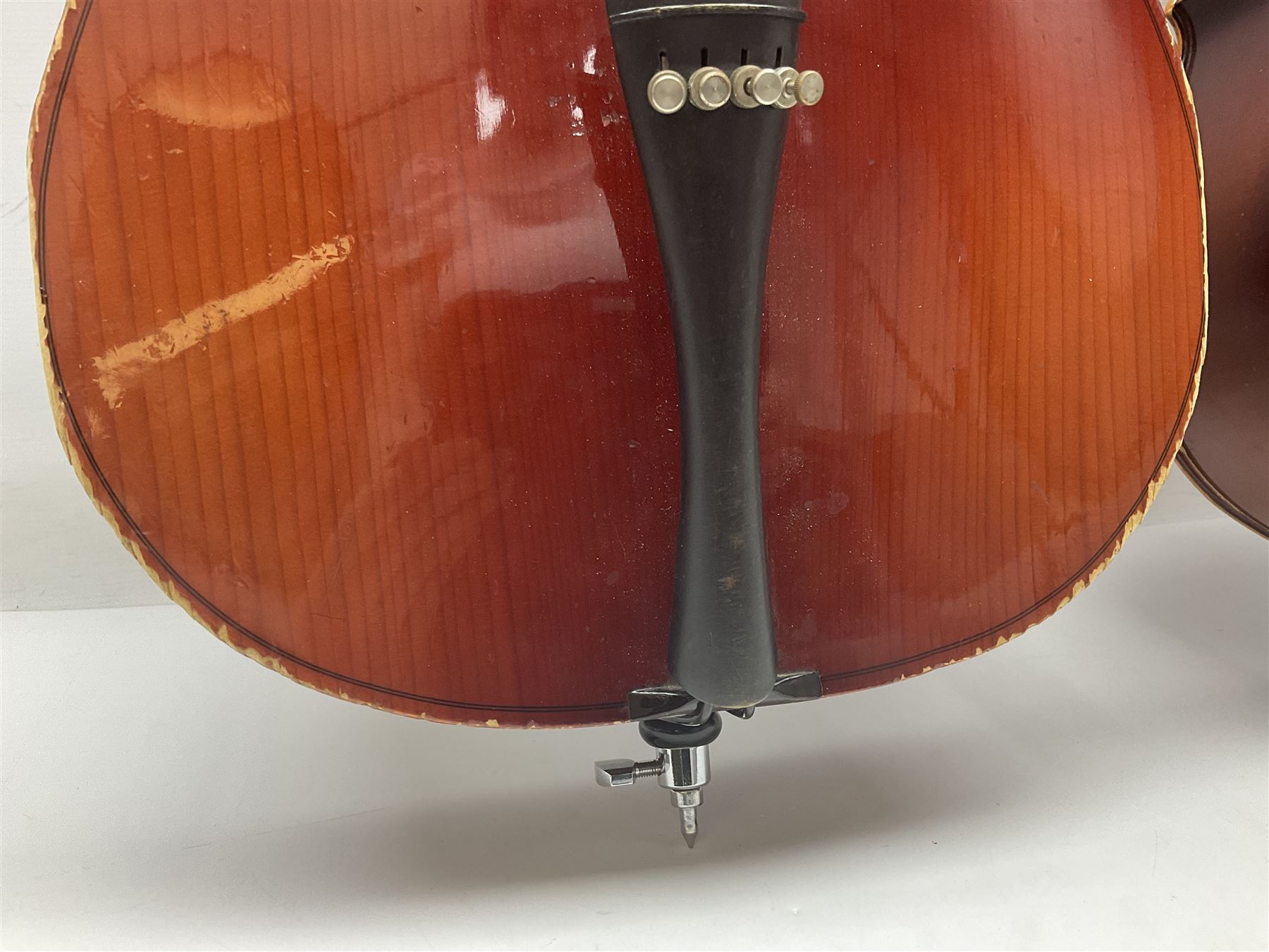 Two student half-size cellos - Boosey & Hawkes Artia with 65cm one-piece back and spruce top; bears maker's label; L104cm overall; and Romanian with 65.5cm two-piece maple back and ribs and spruce top; bears label; L108.5cm overall; each in soft carrying case with two bows (2)