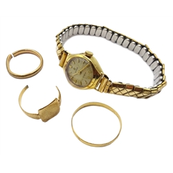  9ct scrap gold rings 5.6gm and a Cyma 9ct gold wristwatch on expanding bracelet   