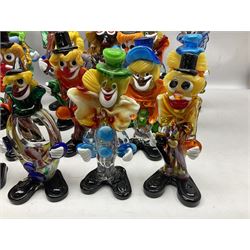 Large quantity of Murano glass clowns, to include larger examples, in two boxes