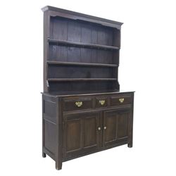 Georgian design oak dresser and rack, fitted with three drawers and two cupboards, complet...
