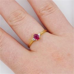18ct gold three stone oval cut ruby and round brilliant cut diamond ring, stamped 750, ruby approx 0.30 carat