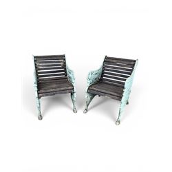 Pair of unusual Victorian revival heavy cast iron garden chair benches, ornate scrollwork detail with squirrels and nature, serpentine wood slatted seat and back - design by George Smith at the Sun Foundry, Glasgow