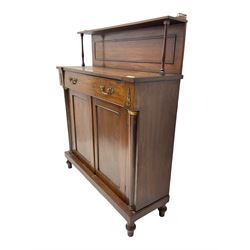 19th century mahogany and brass mounted chiffonier, raised back with gallery supported by turned columns, the rectangular top over single drawer and double cupboard flanked by pilasters, plint base on turned feet