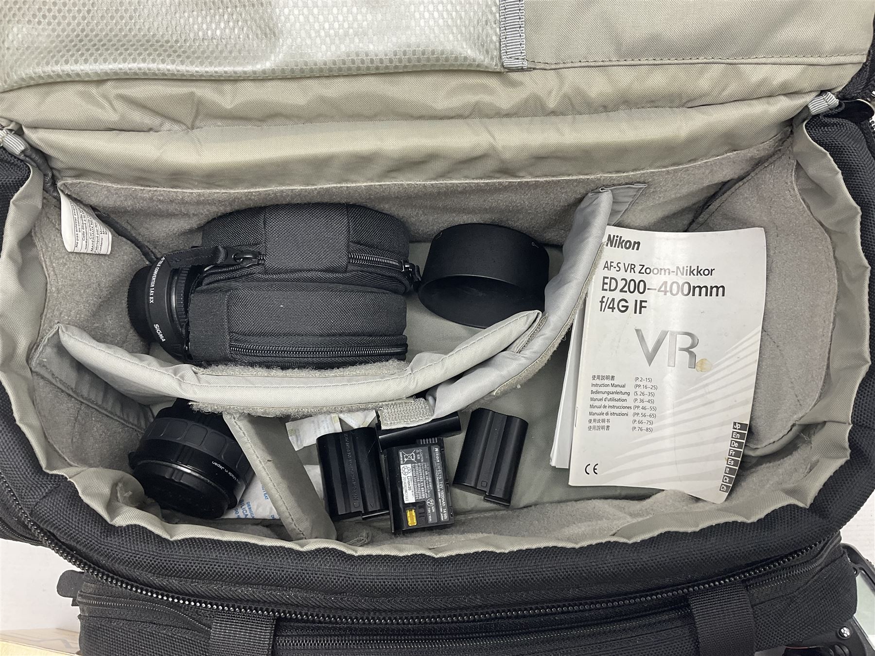 Nikon D7100 camera body, serial no 4370016, with Nikon 'AF-S Micro Nikkor 60mm 1:2.8G ED' lens serial no 234883 and battery Grip HN-D7100, with Lowepro camera bag  