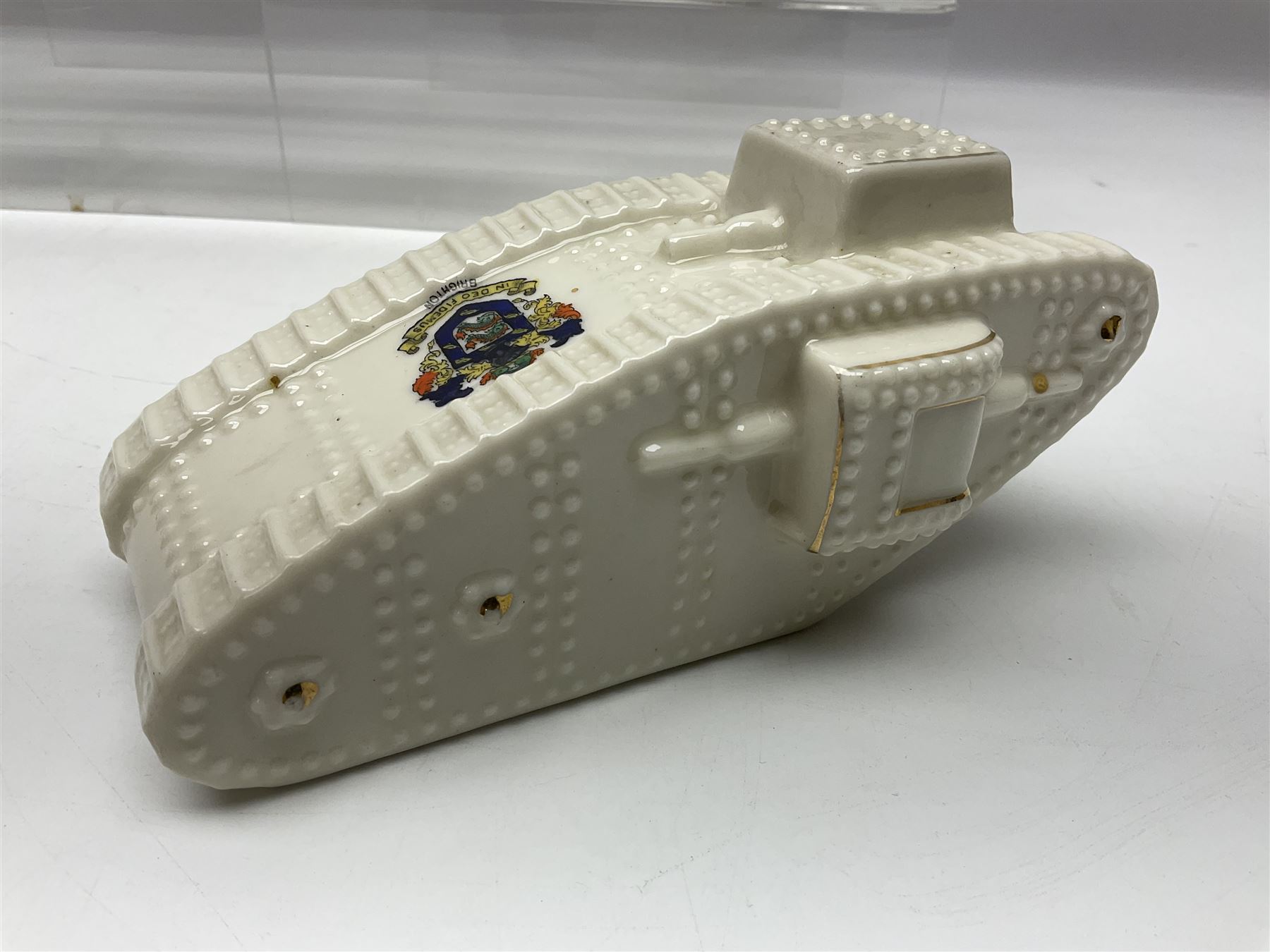 Ten WW1 crested china military models of tanks and field guns; various makers including Goss, Grafton China, Arcadian China, Savoy China etc; various crests including Portsmouth, Brighton, Pendleton, Paignton, Cowes, Flamborough etc (10)