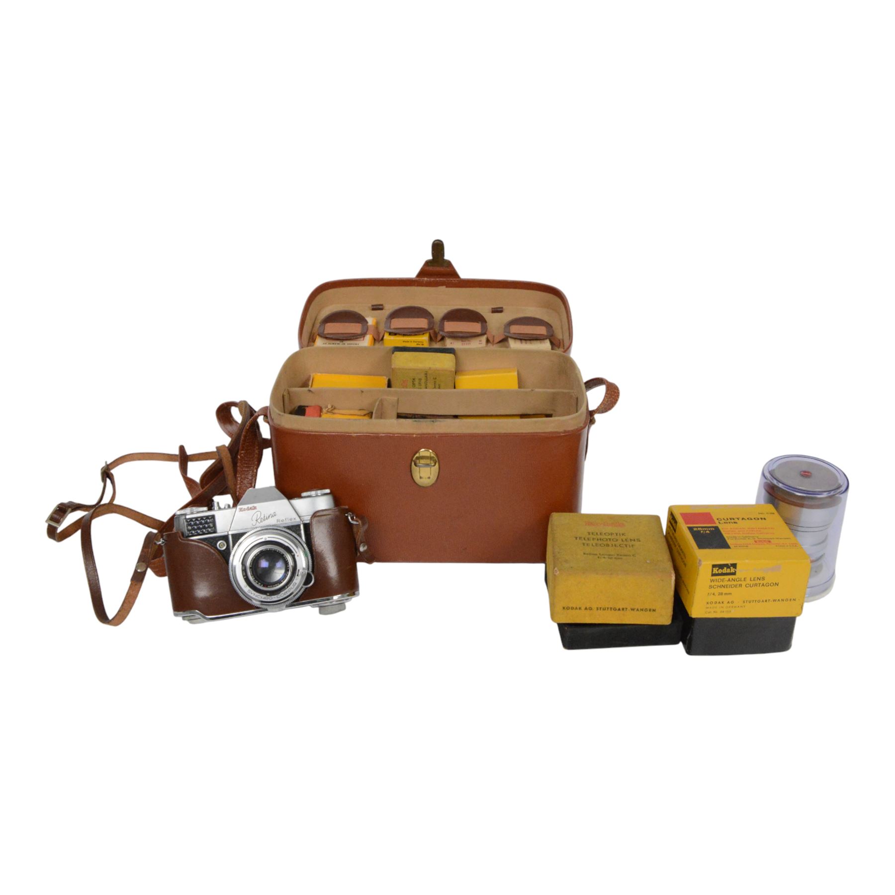 Kodak Retina Reflex camera outfit, comprising camera body serial no. EK 83509, six Schneider-Kreuznach lenses including Retina-Xenon f:2.0/50mm, Retina-Tele-Xenar f:4/135mm, Retina-Curtagon f:4/28mm and Retina-Longar-Xenon f:4/80mm, Retina-Curtar-Xenon f:4/35mm, Retina-Curtar-Xenon f:5.6/35mm, filters, platform and hood, contained within a tan Rowi carry case