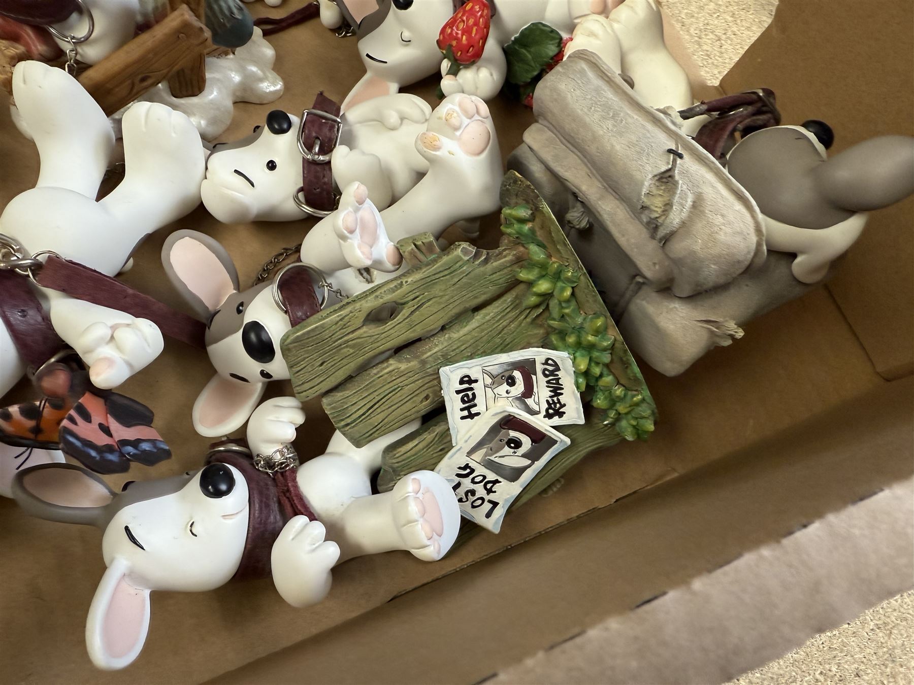 Collection of Craig Davison Xystos 'Lost Dog' figurines, including two larger examples 'This Game Takes Two' and 'Sit!', and smaller examples including 'A Christmas Shared' and 'Handle With Care', largest H28cm