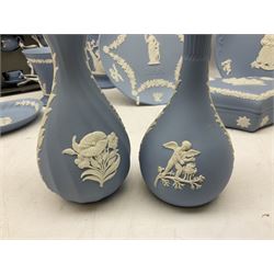 Wedgwood pale blue Jasperware, to include a pair of tulip vases, large vase with fluted rim, trinket dishes, trinket box etc, together with Wedgwood miniature hanging decoration in the form of a tea set 