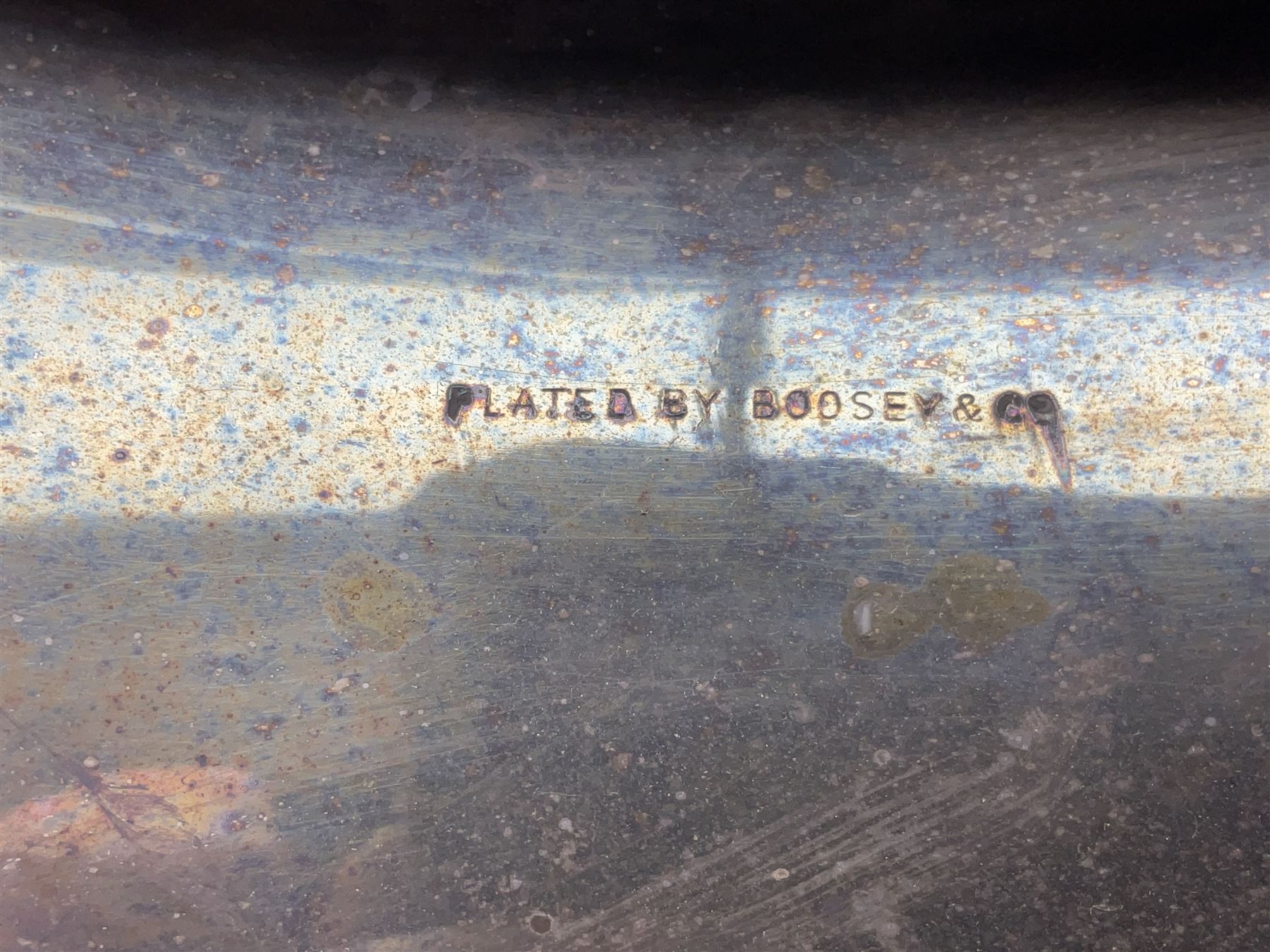 Boosey & Co silver plated 'Solbron' Class A Tuba c1920, serial number 102760, with compensating pistons and foliate engraved decoration H106cm 