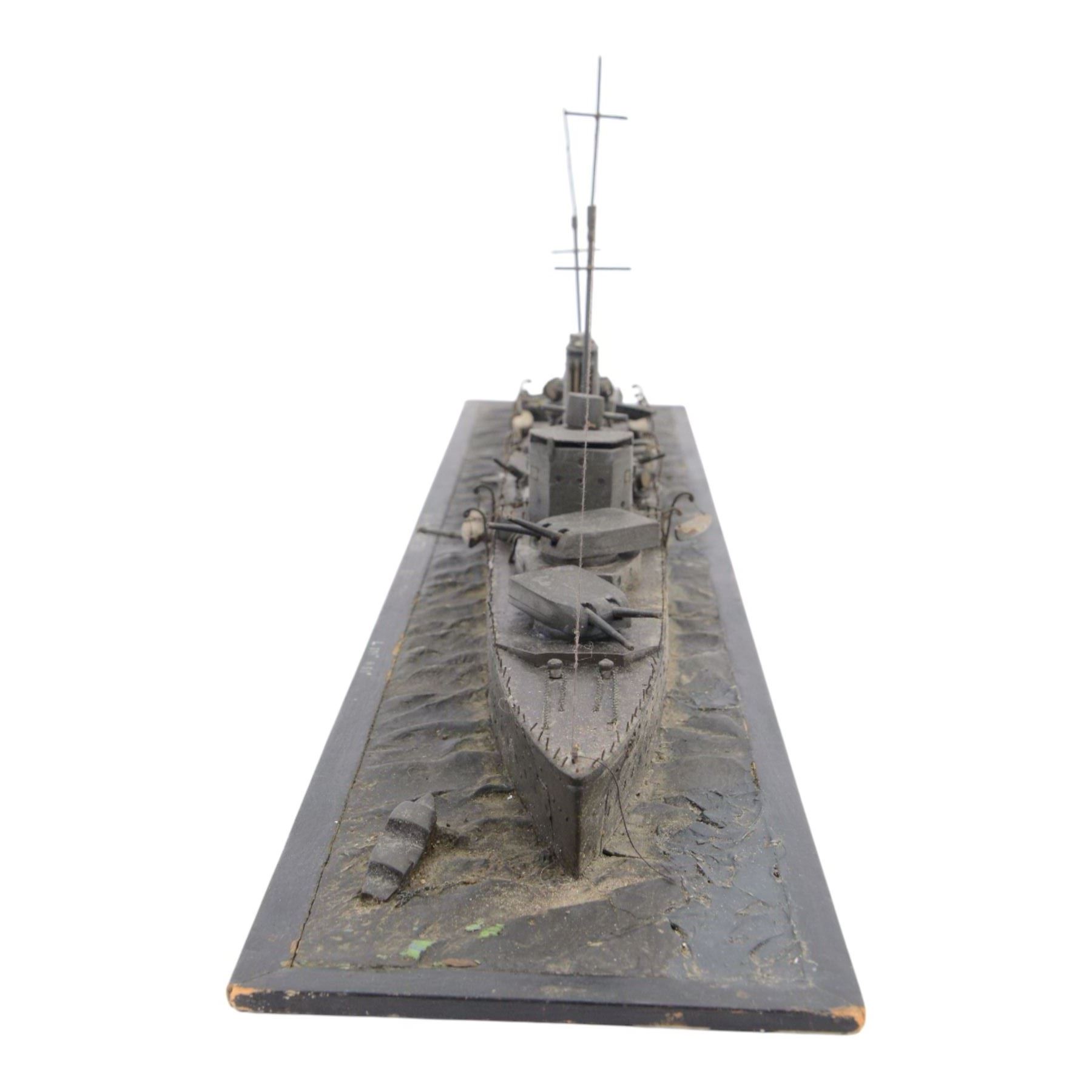  HMS Exeter, Waterline wartime metal model upon a wooden base, circa 1939-45, H24cm, L82cm  