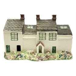 Leeds Pottery pastille burner modelled as two terrace cottages, with impressed mark beneath, H12cm L19cm