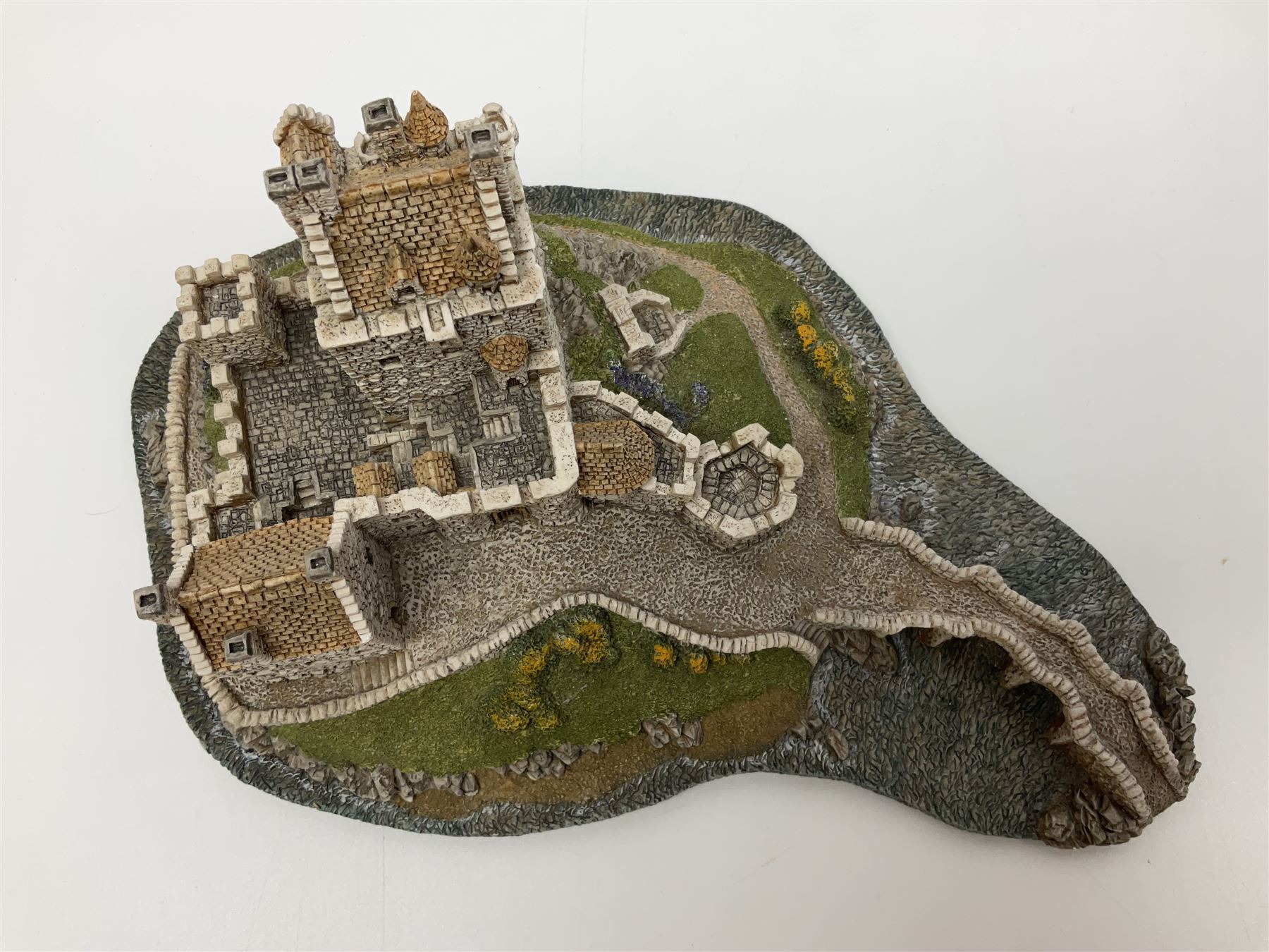 Four Lilliput Lane models from the Scottish Collection, to include Eilean Donan Castle, Claypotts Castle, John Knox House and Stockwell Tenement, all boxed 