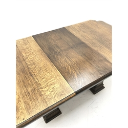 'The Celerity Patent' - Early 20th century oak extending dining table, canted rectangular moulded top with foldout leaf, on two rectangular box supports, 91cm x 122cm - 167cm, H74cm