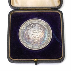 Group of early 20th century sporting medallions, fobs and badges, including two silver Inter Varsity 1/4 mile cased medallions, two silver fobs, white metal and enamel cricket fob etc, one awarded to John Barugh Fisher (1888-1924) born in Amotherby, studied at Leeds University and became doctor in 1911, later Captain John Barugh Fisher R.A.M.C., together with four early 20th century nurses badges, two for General Infirmary Leeds, three inscribed B.P. Simpson, housed in an inlaid work box