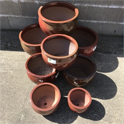  Set eight graduating glazed composite belly pot planters, D45cm, H29cm (max)  