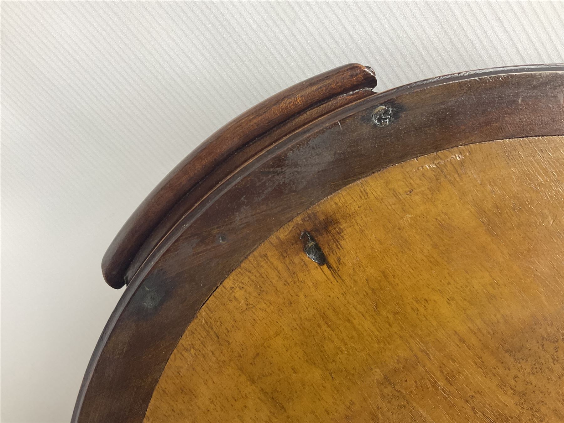 Late 19th/early 20th century mahogany and marquetry inlaid tray, of oval form with twin scrolled handles and moulded border, the central panel inlaid with figures seated at a table drinking tea, L99cm
