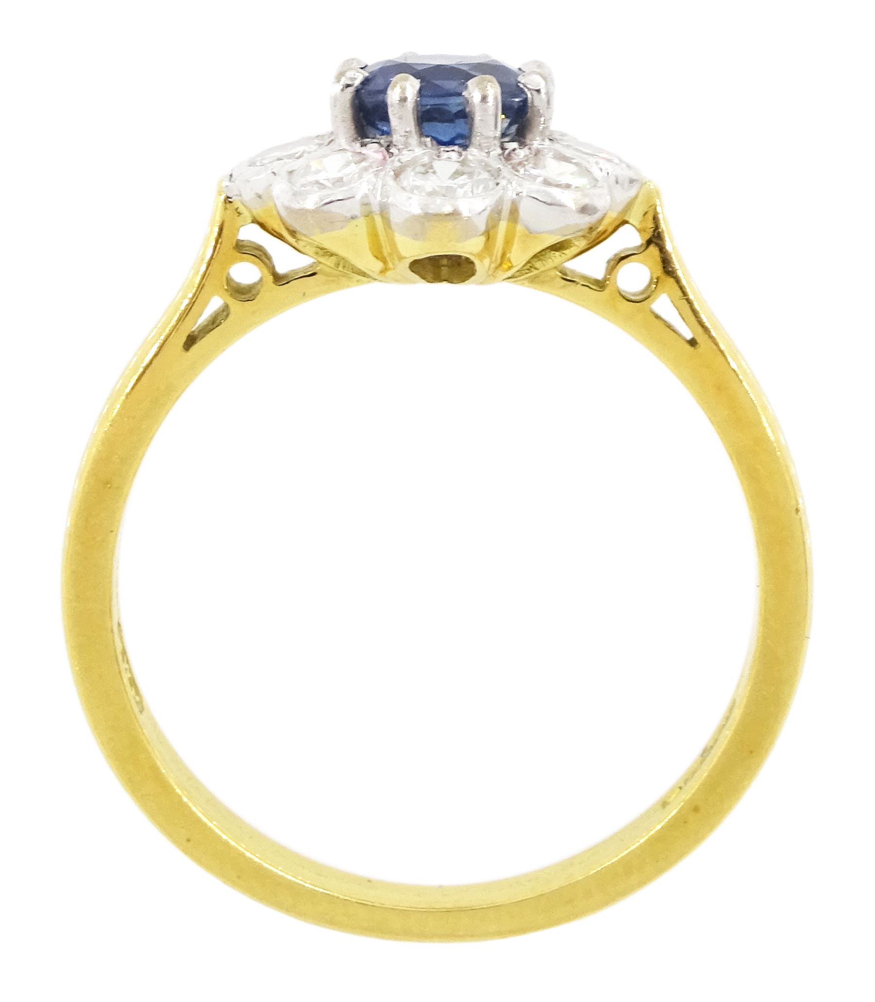 18ct gold round cut sapphire and round brilliant cut diamond cluster ring, hallmarked, sapphire approx 0.50 carat, total diamond weight approx 0.50 carat