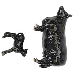 Four Beswick cattle figures, comprising Aberdeen Angus family; Bull, model 1562, Cow, model 1563 and Calf model 1249 and Charolais Cow model 3075