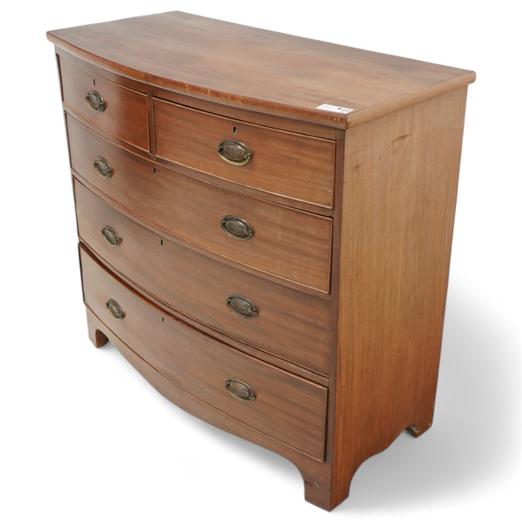 Early 19th century mahogany bow-front chest, two short over three long cock-beaded drawers, on bracket feet