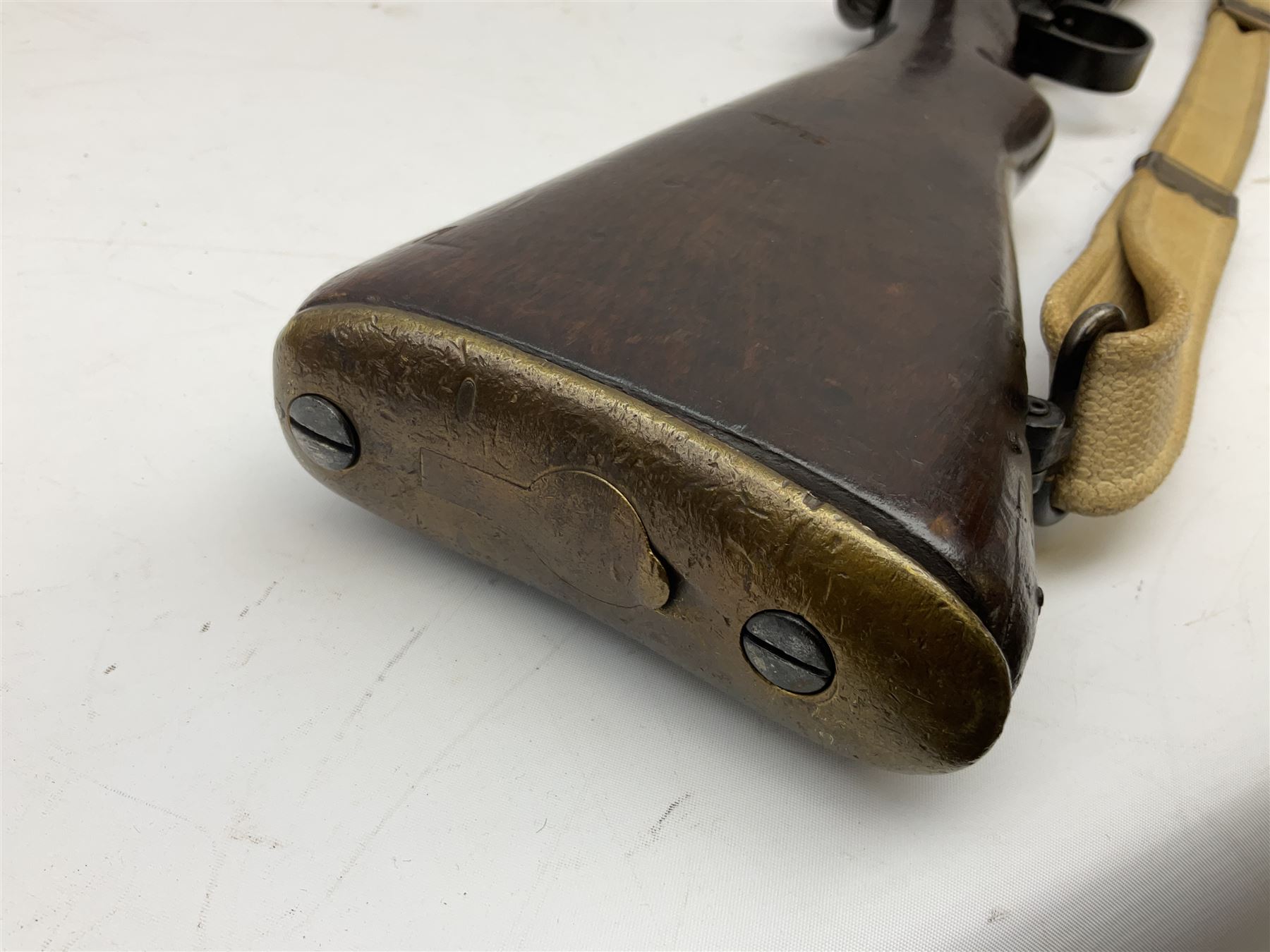 Lee Enfield SMLE .303 No.4 Mk.1* bolt action rifle with 63.5cm barrel and original webbing sling; lacking magazine; No.75C8419; L111cm overall; deactivated to early specification so requires re-deactivation to modern standards SECTION 1 RFD ONLY