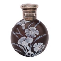 Victorian Thomas Webb silver mounted cameo glass scent bottle, hallmarked Sampson Mordan and Co, London 1884, the cameo glass body of circular form, decorated with white flowers and foliage in high relief upon a black ground, the hinged cover opening to reveal the original stopper, H6cm 