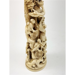 19th century Japanese carved ivory okimono, modelled as a tower of figures, H18cm 
