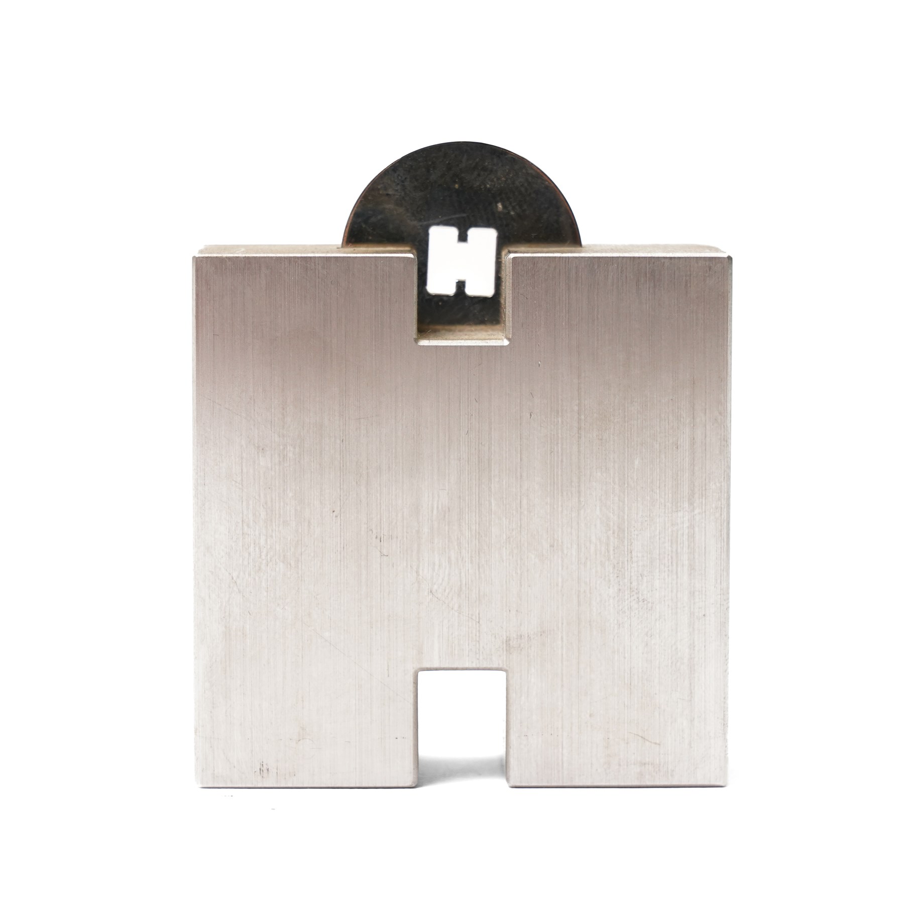 Hermès - ‘H’ pencil sharpener, brushed palladium-tone metal, with black leather-covered pencil, two original boxes and booklet