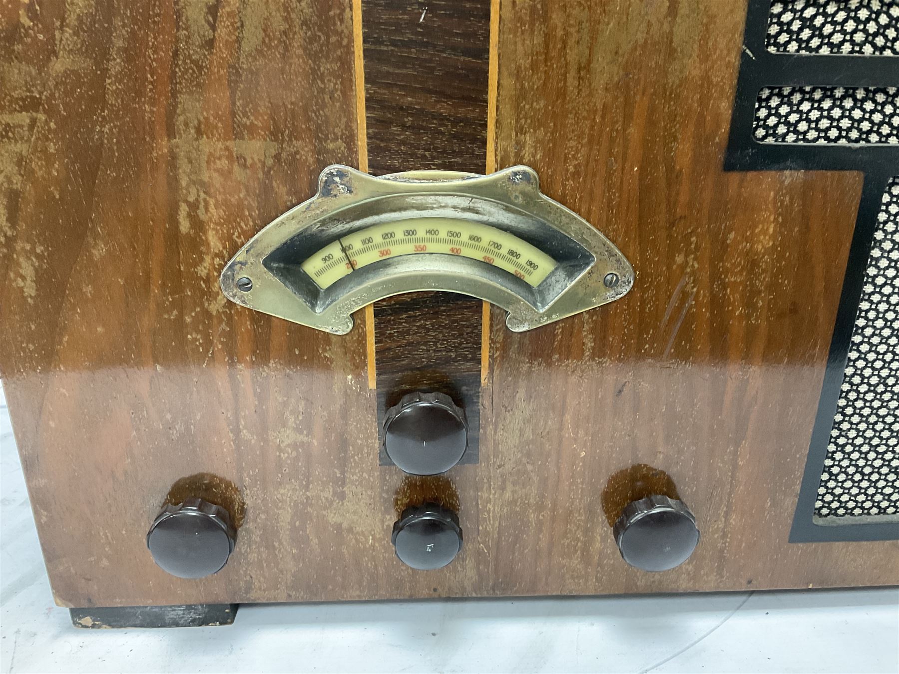 Two 1930s radios, comprising Art Deco Lotus valve example with copper fixtures, H50cm W37cm  together with a Swan Aerodyne example decorated with inlay