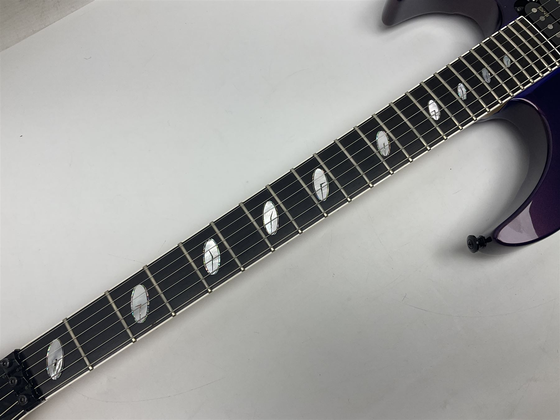 2015 Japanese Caparison Dellinger Prominence hand made boutique rock guitar in spectrum blue with clock inlays and Scaller tremolo; serial no.3200018; L100cm; in fitted case with certificate, registration card, tools etc