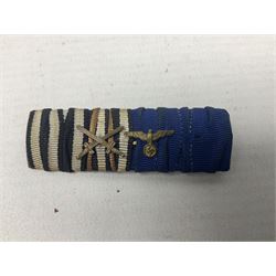 German tunic two-medal ribbon bar for WW1 Iron Cross and Long Service Medal; together with  WW2 German Mothers Cross 'Mutterehrenkreuz' 1st Class gilt with ribbon, inscribed verso 16 Dezember 1938 with Hitlers facsimile signature (2)