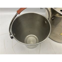 Stainless steel Laurent-Perrier champagne bucket, with engraved brass plaque and grip to swing handle, together with two matching smaller, largest D38cm (3)