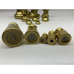 Graduated set of eight brass bell weights, together with a set of five graduating weights (13)