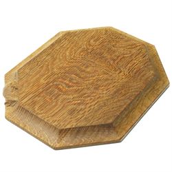 Mouseman - oak chopping board, of canted octagonal form, with carved mouse signature, by the workshop of Robert Thompson of Kilburn