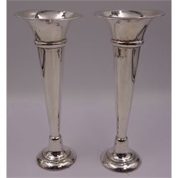 Pair of modern silver trumpet vases, each with fluted rim, upon tapering stem and slightly domed weighted circular foot, hallmarked Charles S Green & Co Ltd, Birmingham 1971, H20cm