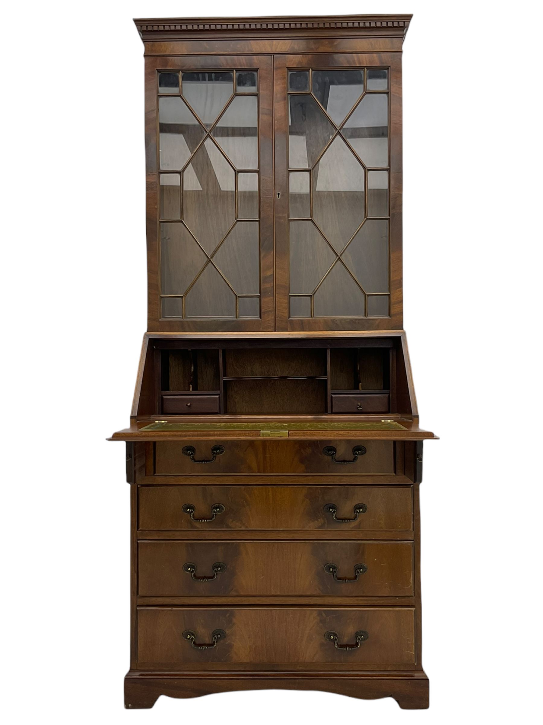 Reproduction mahogany bureau bookcase, the glazed bookcase over fall front bureau fitted with four drawers, on bracket feet