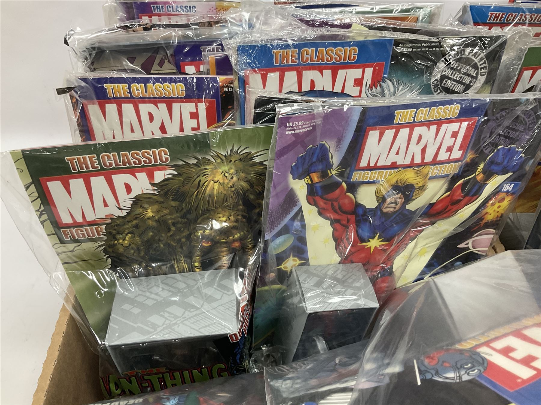 Eaglemoss The Classic Marvel Figurine Collection - forty-one magazines with models each as issued in unopened plastic bags; eleven boxed models and eight loose periodicals; in three boxes (60)
