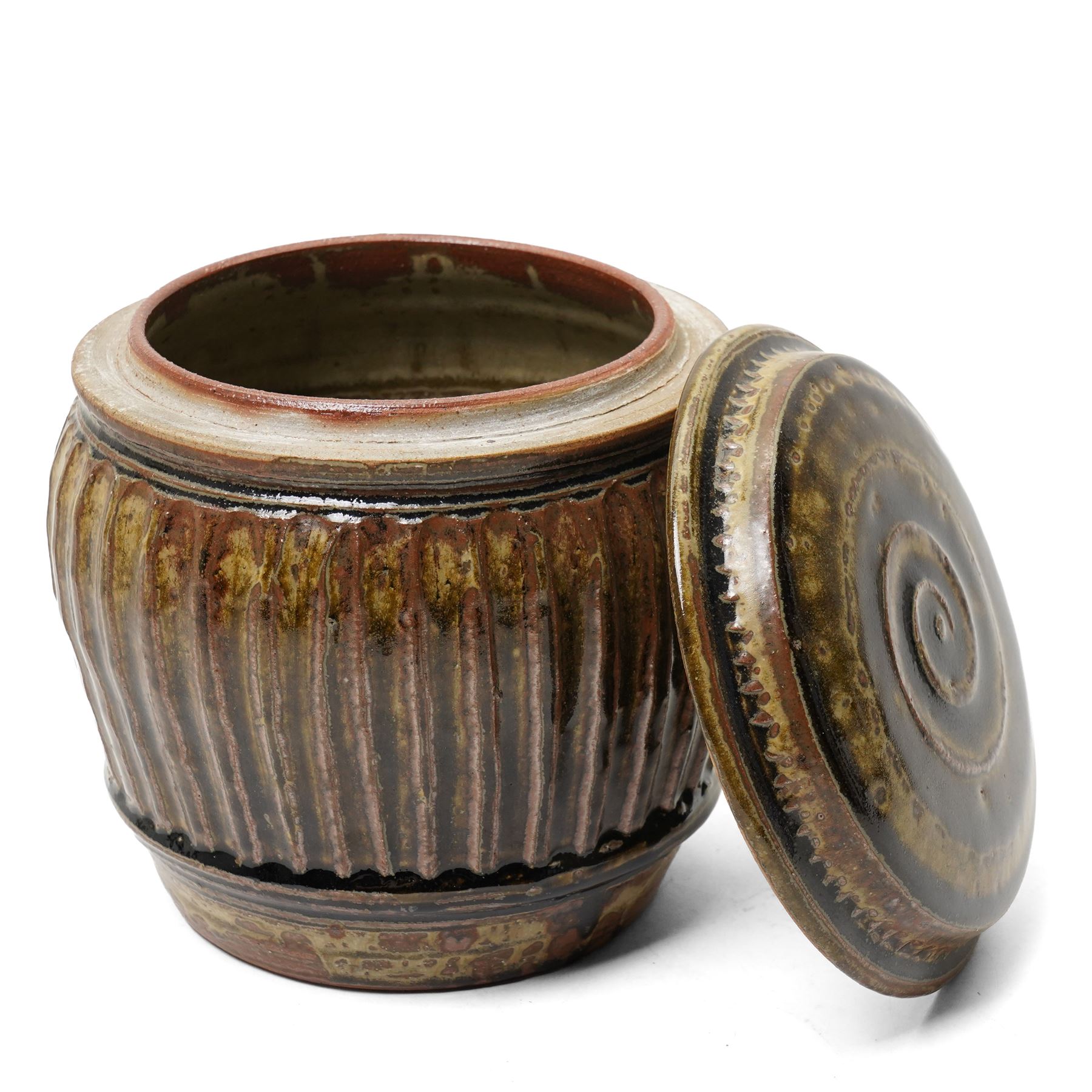 Mike Dodd (1943-): Covered studio pottery storage jar, of fluted barrel form, impressed marks to foot, H20cm 
