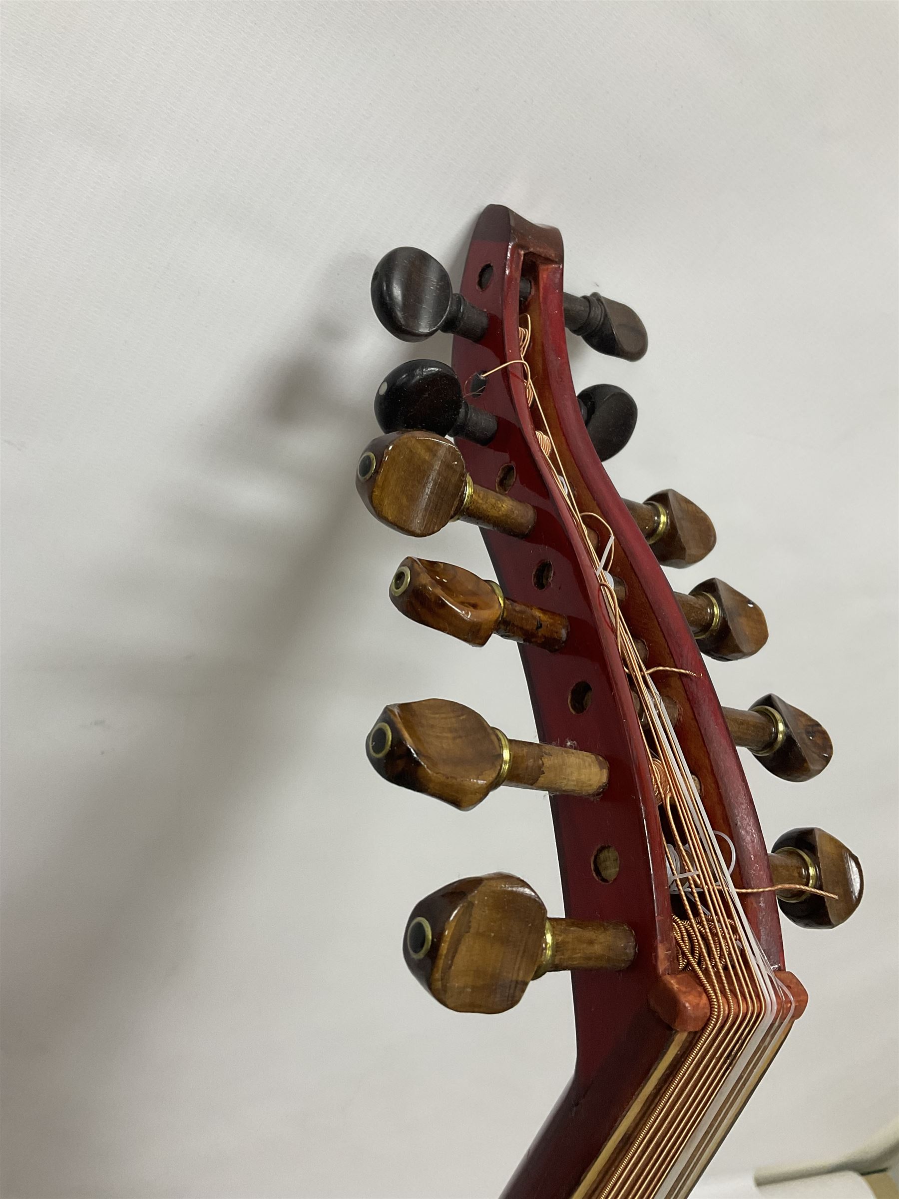 20th century Middle Eastern six string lute with a segmented back and a purpose designed hardwood stand
