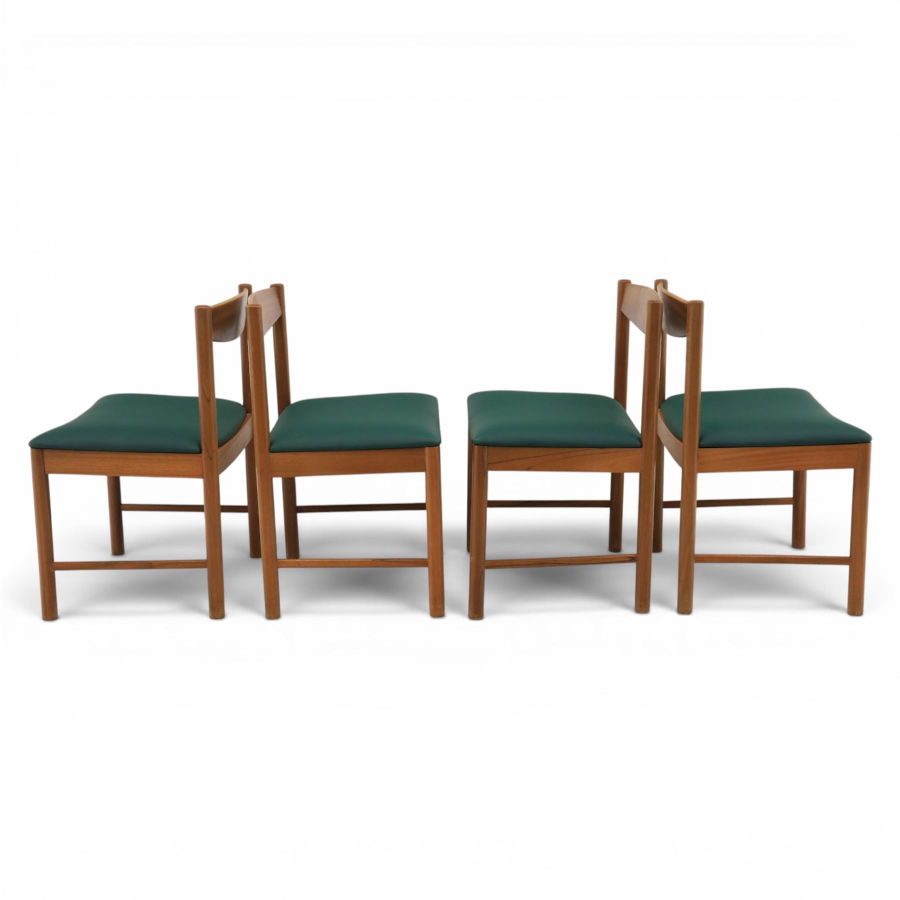 A.H. McIntosh - Mid-20th century teak extending dining table and four chairs, teak top table with internal fold over leaf extending to 193cm, raised on cylindrical tapering supports