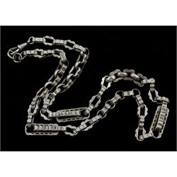 Victorian silver fancy link watch chain with engraved decoration and later spring loaded clip
