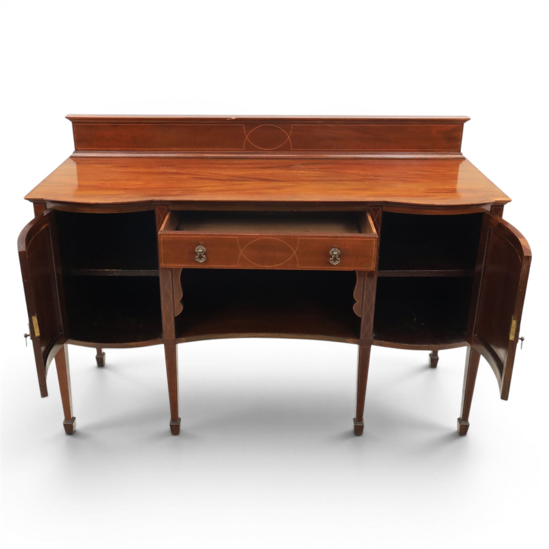 Edwardian mahogany and satinwood sideboard, shaped top with galleried back, with freize drawer flanked by two cabinets, united by undertier, raised on square tapering supports terminating in spade feet