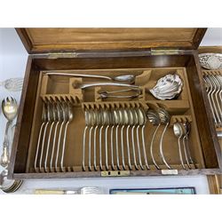 Oak cased Mappin & Webb part canteen of silver plated Scroll pattern cutlery, the box with twin brass drop handles to sides and vacant brass cartouche to the hinged cover, opening to reveal plaque and lining detailed 'Mappin & Webb', and three stackable fitted trays containing the part canteen, together with a small quantity of assorted and mostly silver plated flatware 