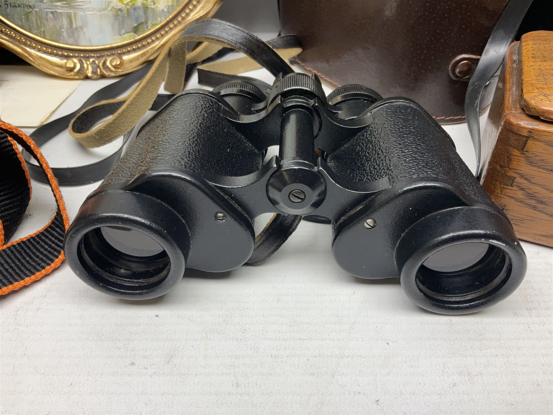 Three pairs of binoculars to include Enbeeco Concord and Bresser, Palestine police patch, framed pictures etc