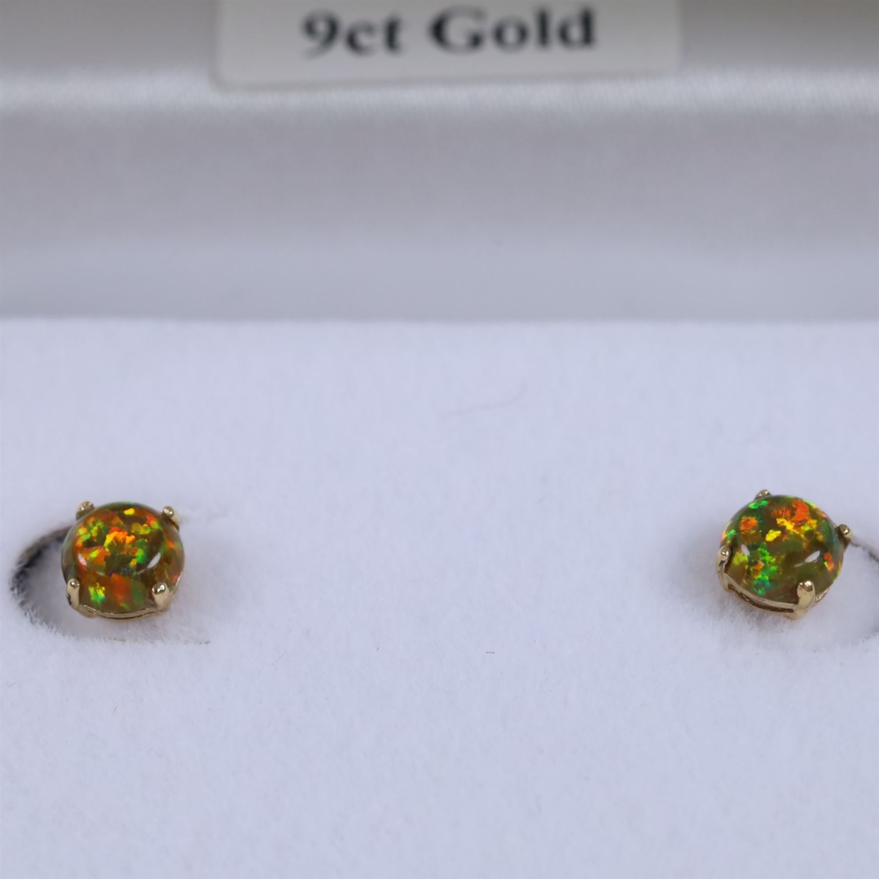 Pair of 9ct gold opal stud earrings, boxed