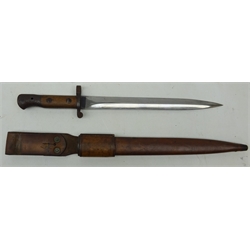  British WWll Bayonet, 30cm twin edge fullered bale stamped Wilkinson London, part wood grip, in leather sheath, mount stamped with arrow, frog stamped with Crown above E, L48cm  