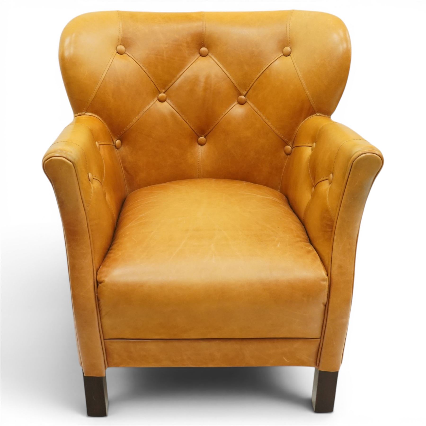 John Lewis - Pair of ochre leather tub chairs, downswept arms, button back and arms, raised on dark supports 
