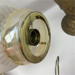 Gilt metal table lamp, heavily embossed with flowers and butterflies, with fluted frosted glass shade, H56cm