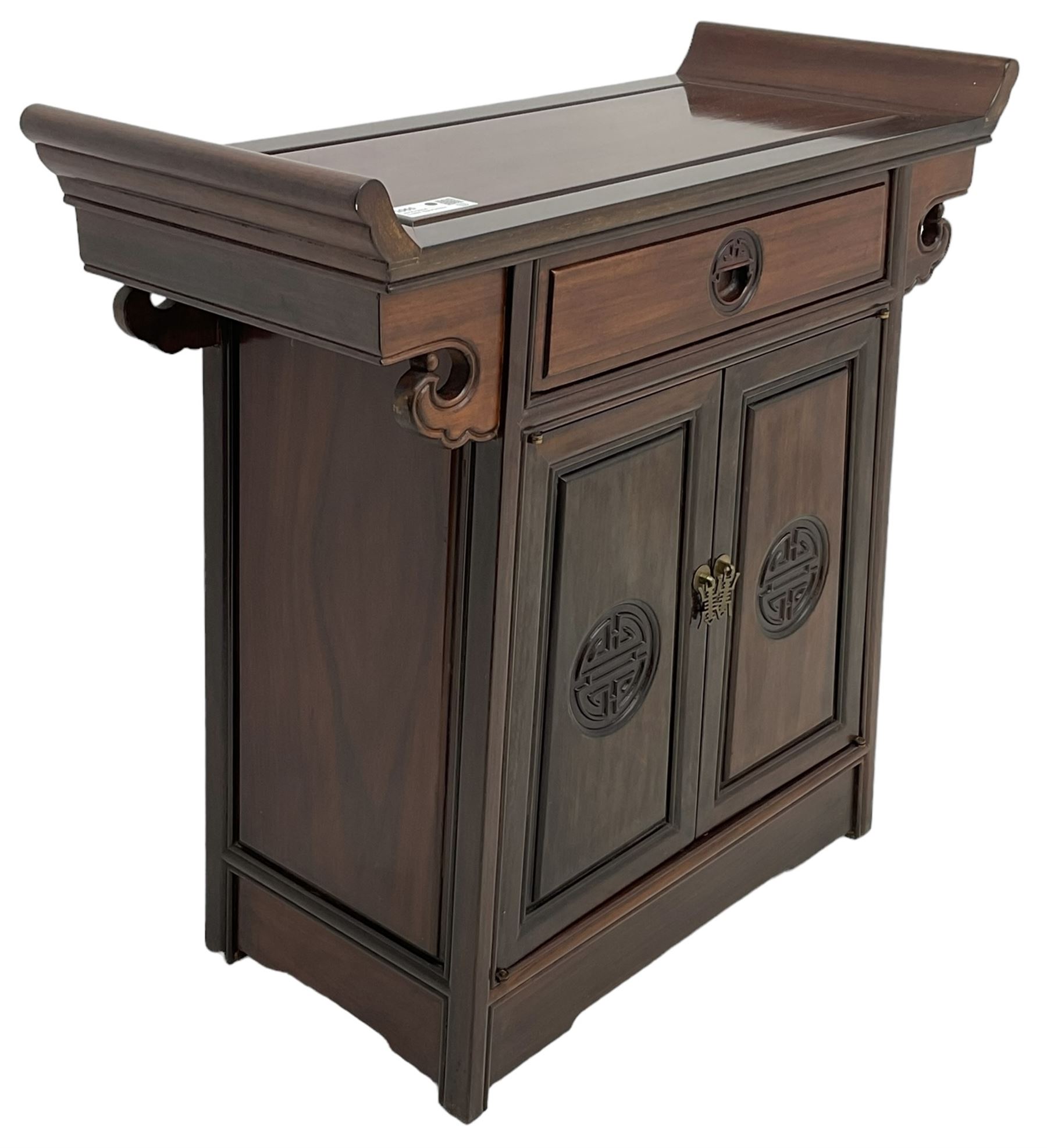 Chinese hardwood altar table, single drawer over double cupboard, two panelled doors carved with Shou motifs 